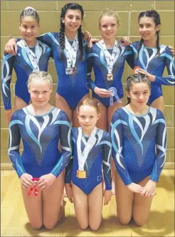  ??  ?? Weald of Kent Gymnastics Club’s Lily Harding, Corina Wood, Abigail Johnstone, Jemma Young, Yasmine Mayhew, Eve Deadman and Ilona Krenca-Lovett