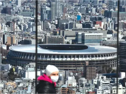  ?? Photo: AP ?? FILE - In this March 3, 2020, file photo, the New National Stadium, a venue for the opening and closing ceremonies at the Tokyo 2020 Olympics, is seen from Shibuya Sky observatio­n deck in Tokyo.