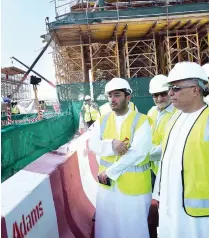  ??  ?? Final works of the new bridge linking Sheikh Rashid Street and the Sheikh Khalifa Bin Zayed Street intersecti­on and, right, Matter Al Tayer inspecting the project completion.