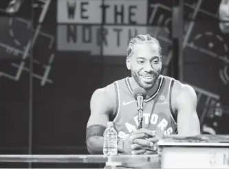  ?? STEVE RUSSELL TORONTO STAR ?? Raptors forward Kawhi Leonard faces the media Monday at the Scotiabank Arena in Toronto.