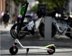  ??  ?? The arrival of electric scooters has forced Madrid and other Spanish cities to regulate the new trend.— AFP photo