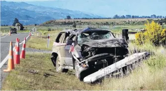  ?? PHOTO: MARK PRICE ?? The remains of a car involved in a fatal crash near Luggate on Thursday night.