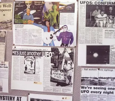  ??  ?? CLOCKWISE FROM TOP LEFT: News clippings of UFO sightings plaster the restaurant walls; Wycliffe Well’s signs are just a little different; The UFO murals that make perfect selfie fodder.