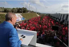  ?? Reuters; AFP ?? Clockwise from top, a Turkish woman votes at the Doha embassy; Mr Erdogan at a rally; posters of Mr Erdogan in Istanbul