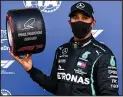  ??  ?? LEADER: Lewis with pole award
