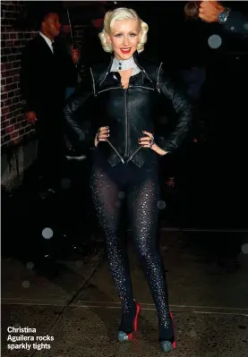  ??  ?? Christina Aguilera rocks sparkly tights