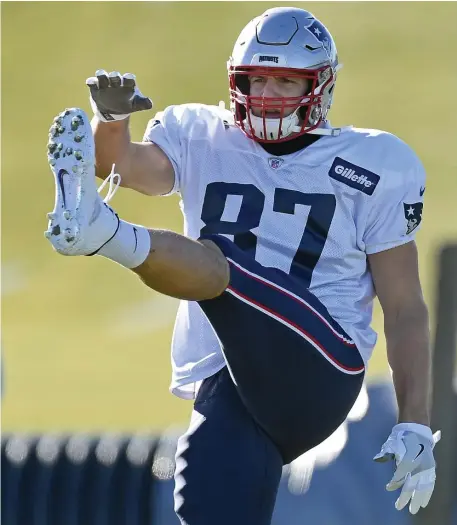  ?? CHRISTOPHE­R EVANS / BOSTON HERALD ?? STAYING LOOSE: As Rob Gronkowski prepares for the postseason with the Patriots set to host the Chargers on Sunday, the tight end said he is not dwelling on his future.