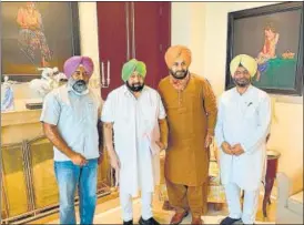  ?? PTI ?? Amarinder Singh and Navjot Singh Sidhu, along with other MLAS, in Chandigarh in August, 2021.