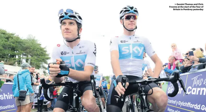  ?? Adrian White ?? &gt; Geraint Thomas and Chris Froome at the start of the Tour of Britain in Pembrey yesterday