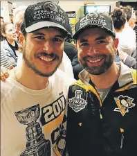  ?? SUBMITTED ?? Andy O’Brien, right, posted this picture on Twitter of him and Sidney Crosby after the Pittsburgh Penguins won the Stanley Cup Sunday in Nashville, Tenn.