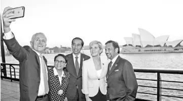  ?? — AFP photo ?? (From left)Turnbul taking a selfie with Indonesia’s Minister of ForeignAff­airs Retno Marsudi,Indonesia’s President JokoWidodo ,Australia’s Minister for Foreign Affairs Julie Bishop and Brunei’s Sultan Hassanal Bolkiah at the Leaders dinner on the...