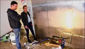  ?? Steve Barnes / Times Union ?? Luke and Terri Gladue, of Gladue Properties, which owns 95 Remsen St. in Cohoes, where Cafe Monocle was located, survey the former kitchen.