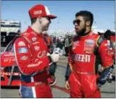  ?? RALPH FRESO — THE ASSOCIATED PRESS FILE ?? Ryan Reed, left, interviews fellow driver Darrell Wallace Jr. in March at Phoenix Internatio­nal Raceway in Avondale, Ariz.