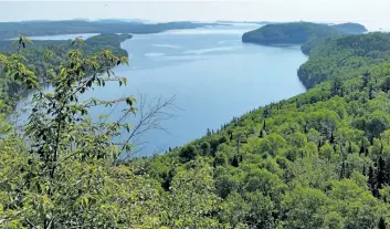  ?? THE CANADIAN PRESS HANDOUT ?? Big Trout Bay on Lake Superior is shown in a handout photo. The Nature Conservanc­y of Canada says it has purchased more than 1,000 hectares of property on the north shore of Lake Superior that is crucial to species such as bald eagles and peregrine...