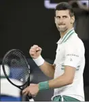  ?? AP photo ?? Novak Djokovic celebrates after defeating Aslan Karatsev in their semifinal match at the Australian Open on Thursday.