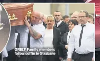  ??  ?? GRIEF Family members follow coffin in Strabane