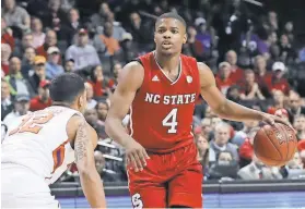  ?? ANTHONY GRUPPUSO, USA TODAY SPORTS ?? Former North Carolina State point guard Dennis Smith has impressed scouts with his athleticis­m.