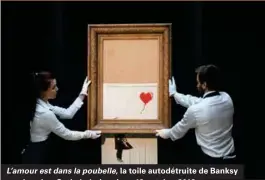  ??  ?? L'amour est dans la poubelle, la toile autodétrui­te de Banksy vendue chez Sotheby's, Londres, 12 octobre 2018.