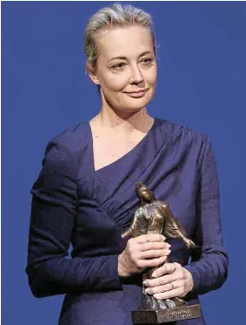  ?? /Reuters ?? Fallen hero: Yulia Navalnaya, the widow of late Russian opposition leader Alexei Navalny, holds the Dresden 2024 Peace Prize statuette in Dresden, Germany, on Sunday. It was awarded posthumous­ly to Navalny, who died in a penal colony in February.