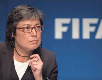  ?? PHILIPP SCHMIDLI, GETTY IMAGES ?? Moya Dodd, shown at a news conference in December 2015, lost her bid for a FIFA Council seat.