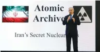  ?? Cohen/Reuters) (Amir ?? THEN-PRIME MINISTER Benjamin Netanyahu unveils Iran’s ‘secret nuclear archives’ during a press conference in Tel Aviv in 2018.