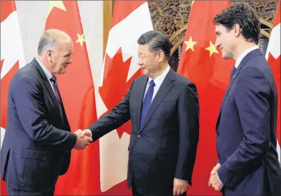  ?? SUBMITTED PHOTO/MARK EYKING OFFICE ?? Sydney-Victoria MP Mark Eyking shakes hands with China’s President Xi Jinping as Prime Minster Justin Trudeau looks on during a recent visit to China.