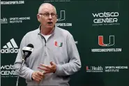  ?? CARL JUSTE — MIAMI HERALD VIA AP, FILE ?? In this Oct. 22, 2019, file photo, Miami NCAA college basketball head coach Jim Larranaga speaks to the media during NCAA college basketball media day in Coral Gables, Fla. The outbreak of the coronaviru­s brought the sports world — the whole world, really — to a screeching halt, and that includes the crucial recruiting period for college coaches that were putting the finishing touches on their 2020classe­s while laying the all-important groundwork for next year’s classes.