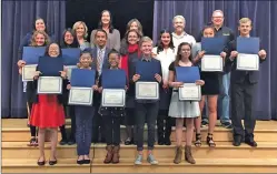  ?? Courtesy photo ?? Finalists and judges at the 4th Annual 8th Grade Speech Week Competitio­n. Front row: 2nd from left; Isabella Cuares (Rio Norte Jr. High - 3rd Place); middle, Jocelyn Fernandez (Rio Norte Jr. High - 2nd Place) and 2nd from right, Annette Brecko...