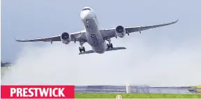  ??  ?? PRESTWICK Turbulence: A flight takes off. Below, parked car is crushed by tree