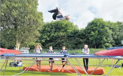  ??  ?? ●● Haslingden High School students with the remaining trampoline­s