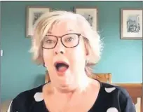  ??  ?? Helen Thurston’s reaction when told she had won £50,000 on the People’s Postcode Lottery.