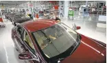  ?? PATRICK TEHAN/STAFF ARCHIVES ?? Tesla said it produced 25,185 vehicles in the third quarter, a 37 percent increase from the 18,345 cars it completed during the second quarter of the year.