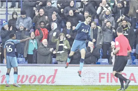  ??  ?? Tottenham's Fernando Llorente celebrates after scoring their second goal in the rout of Tranmere. — AFP photo