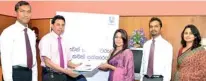  ??  ?? Unilever Sri Lanka Marketing Manager overlookin­g Pears Sharmila Bandara handing over the documentat­ion for the four incubators to Director General Health Services Dr. Palitha Mahipala