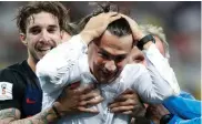  ?? Picture: AP ?? WE LOVE YOU, COACH: Zlatko Dalic is embraced after his team advanced to the final on Wednesday.