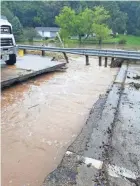  ?? DANE COUNTY EMERGENCY MANAGEMENT ?? The bridge on U.S. 14 over the Black Earth Creek west of Black Earth was washed out by flooding.