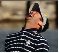  ?? AP/FRANCOIS MORI ?? Bubba Watson of the U.S. reacts after missing a putt on the 15th green during his foursome match with his teammate Webb Simpson on the opening day of the Ryder Cup on Friday at Le Golf National in Saint Quentin-en-Yvelines, France.