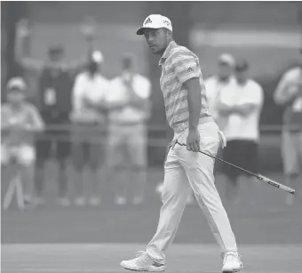  ?? MATT SLOCUM/AP ?? Xander Schauffele watches as his ball goes in for an eagle on the 15th hole during the third round of the Masters golf tournament on Saturday in Augusta, Ga.