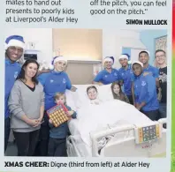  ??  ?? XMAS CHEER: Digne (third from left) at Alder Hey