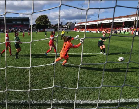  ?? Photo: Stephen McCarthy/Sportsfile ?? Stephanie Roche of Peamount United shoots to score her side’s third goal during the Women’s National League match between Shelbourne and Peamount at Tolka Park in Dublin.