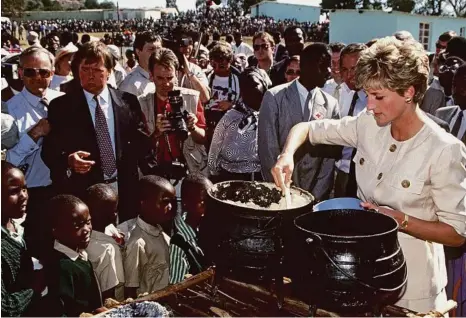  ?? PHOTO: PRINCESS DIANA ARCHIVE/GETTY IMAGES ?? Princess Diana at the Nemazura feeding centre - a Red Cross project for refugees in Zimbabwe, July 1993.