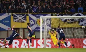  ?? ?? John McGinn scores Scotland’s second goal against Austria. Photograph: Christian Hofer/ Getty