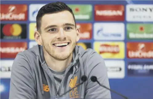  ?? PICTURE: RICHARD SELLERS/PA ?? 0 Liverpool and Scotland full-back Andy Robertson in relaxed mood at yesterday’s pre-match press conference.
