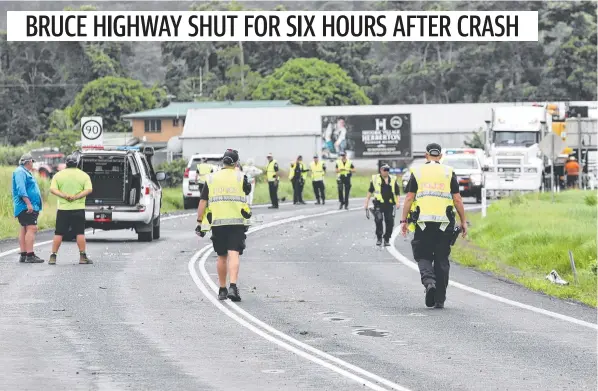  ?? ?? Police at the scene of a multi-vehicle crash on the Bruce Hwy, Goolboo, near Liverpool Creek, south of Innisfail. Picture: Arun Singh Mann