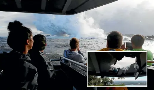  ?? AP ?? Tourists watching lava enter the ocean off Hawaii’s Big Island were injured when their boat was struck by a lava bomb causing damage (inset).