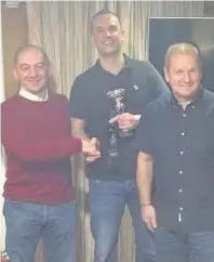  ??  ?? Medal show Shug Rules champion Ross Vallance flanked by club president Walter McAllister (left) and tournament creator Hugh‘Shug’Gallagher (right)
