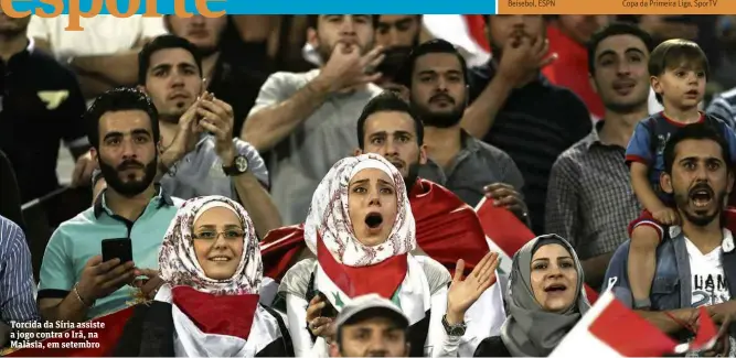  ??  ?? Torcida da Síria assiste a jogo contra o Irã, na Malásia, em setembro