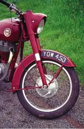  ??  ?? Right: Clean and modern view ahead. The fuel tank’s mounting is covered by a handsome chromed strip, rather more appealing than a rubber bung