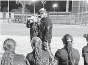  ?? ADAM LICHTENSTE­IN/SUN SENTINEL ?? Park Vista softball coach Joe DellaRocca addresses his team after the Cobras beat West Broward on Friday. Park Vista has won 33 straight games.