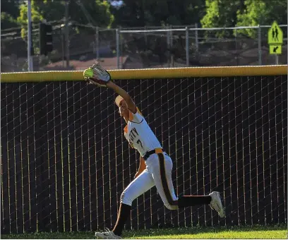  ?? Courtesy of Chris Pedigo ?? Above: Yuba City’s Alexia Alvarez catching the second out of the 7th inning Thursday against Inderkum. YC won 5-2 to get into the D-III playoffs. Below: Tori Hernandez strikes out four in seven innings Thursday.